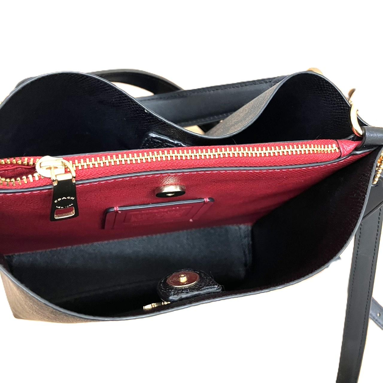 コーチ　モリー バケット バッグ 22 シグネチャー キャンバス　CA582